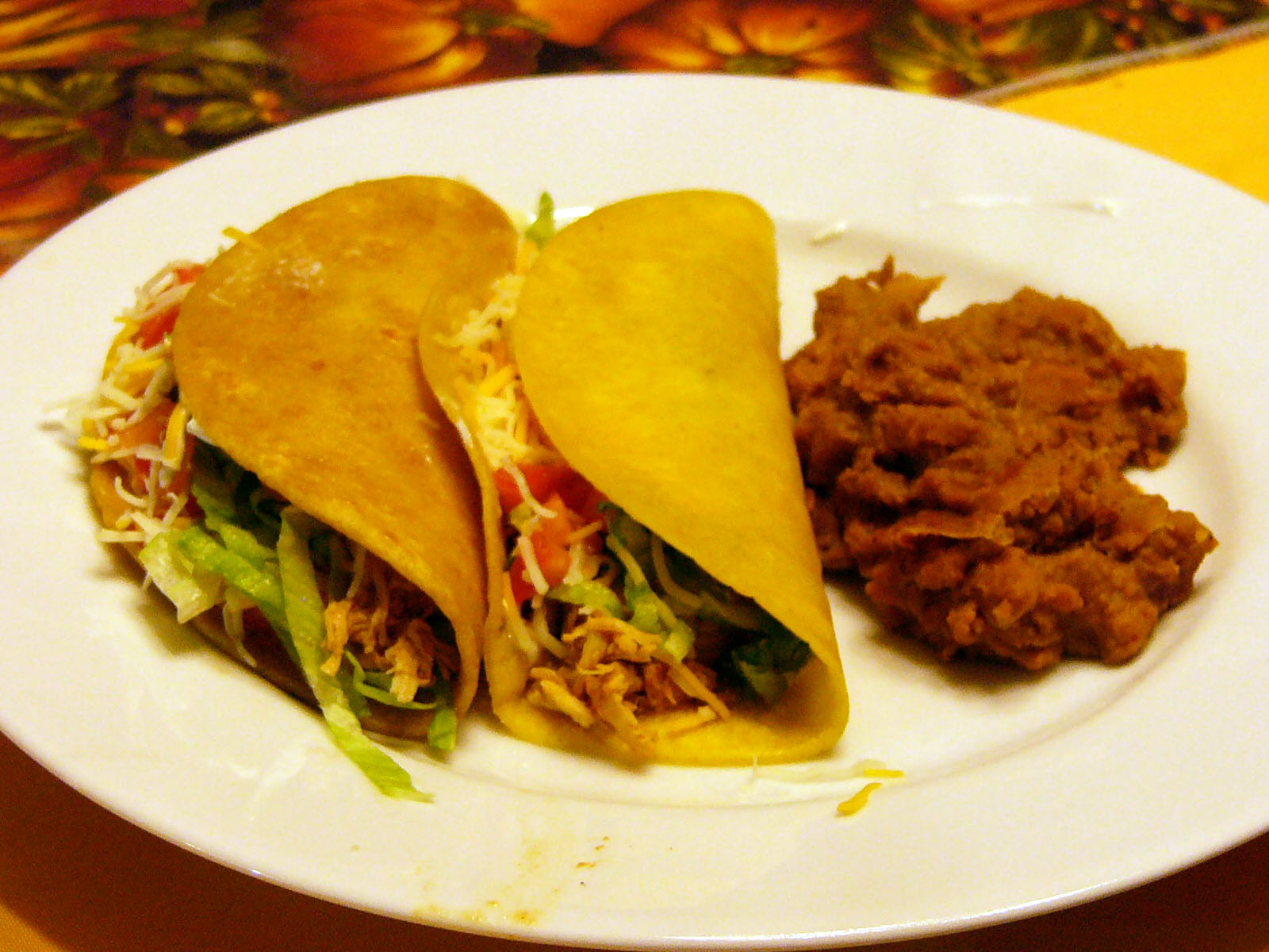 Simply fill the taco shells with the shredded chicken, top with a ...